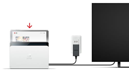 Align your console with the centre of the dock and gently push the console down to insert it. When the console is fully inserted, the screen will go black.