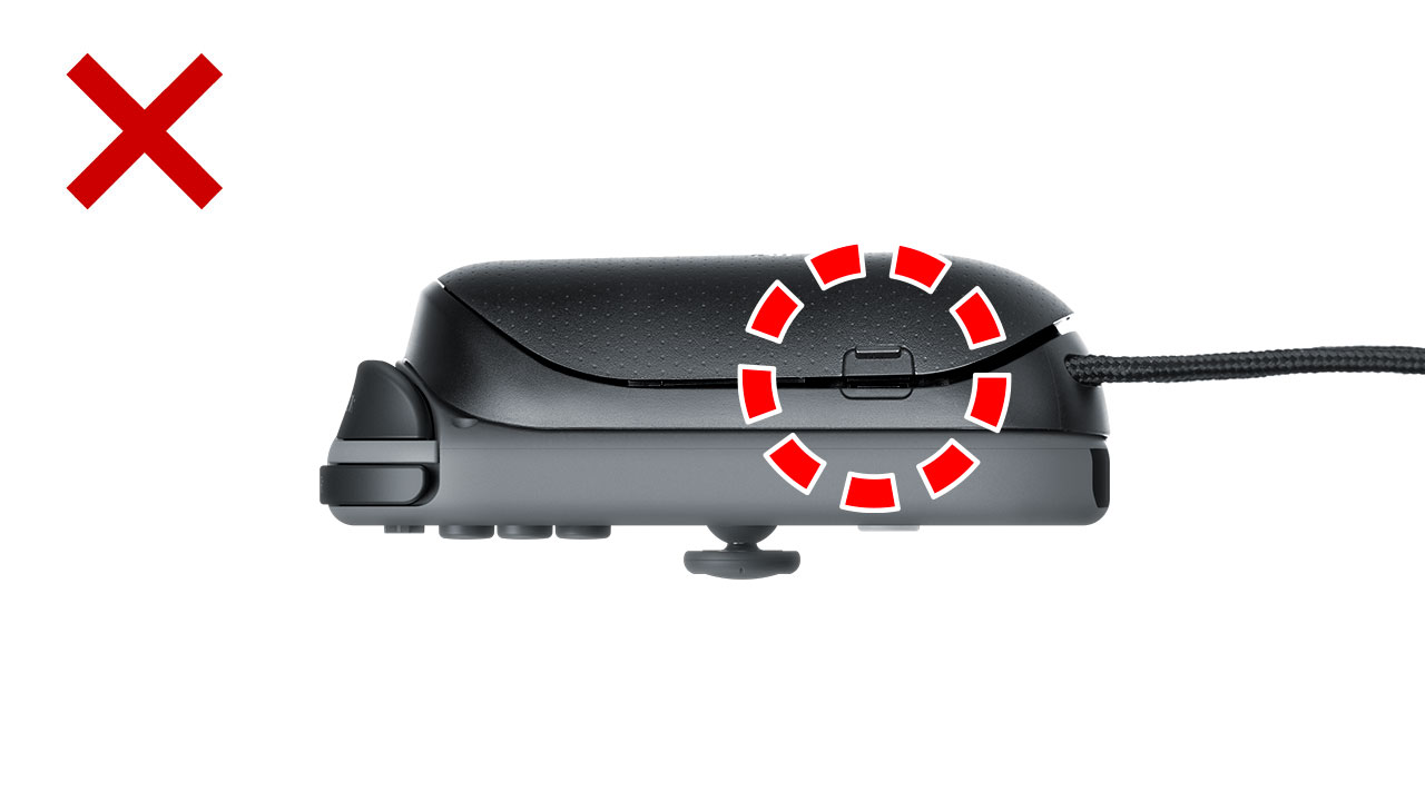 This image shows a cover that's not fully closed. If your cover looks like this, please shut it properly before starting to use the controller.